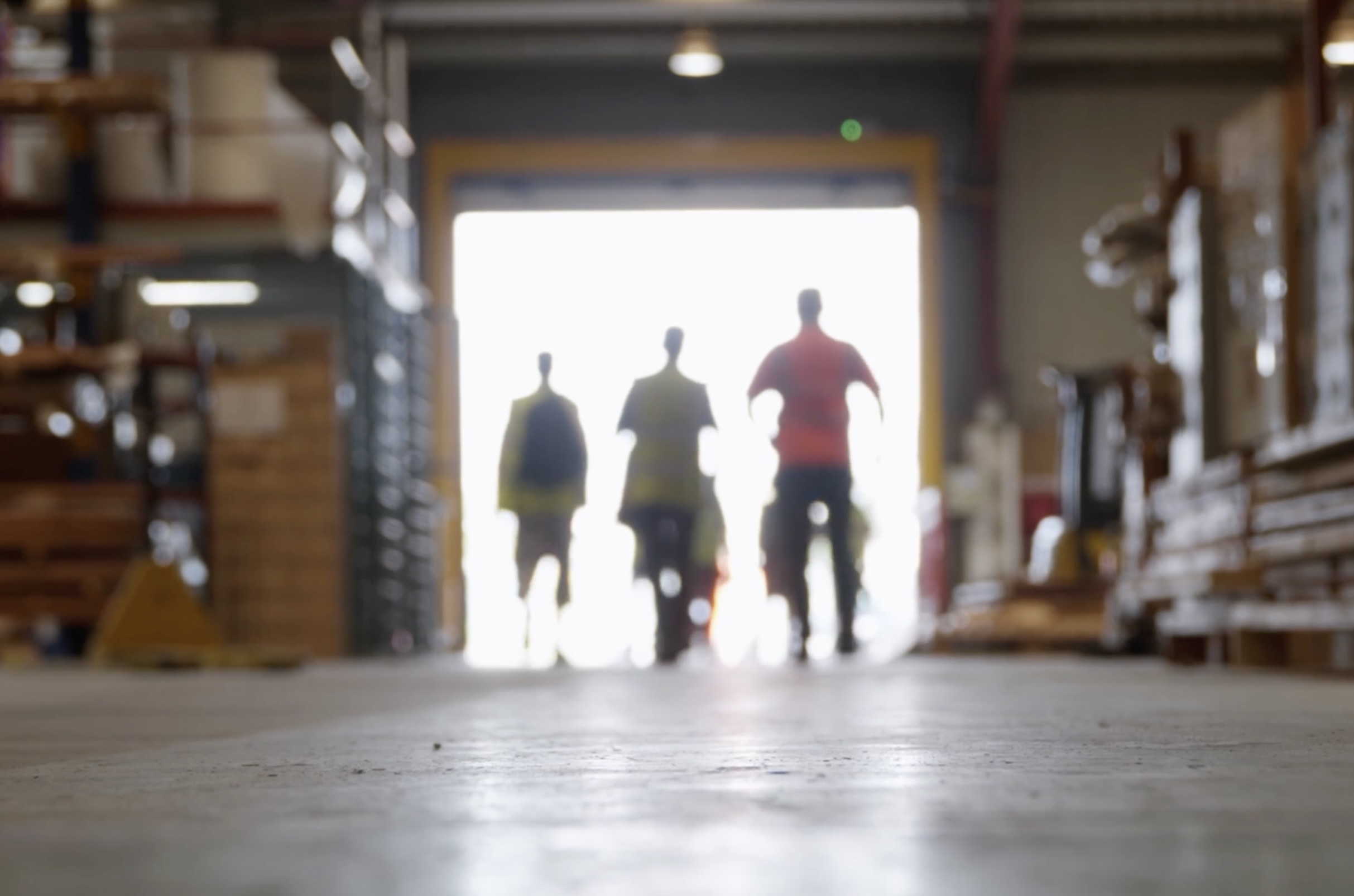 workers leaving sentry doors factory